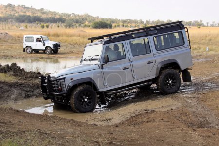 Silver Land Rover Defender 110 SW on 4x4 Course