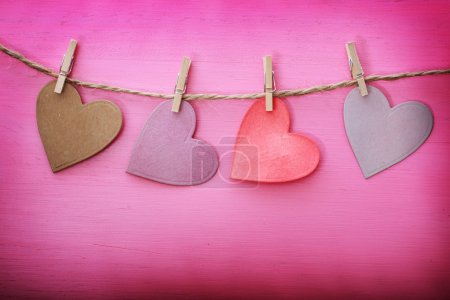 Paper hearts with clothespins