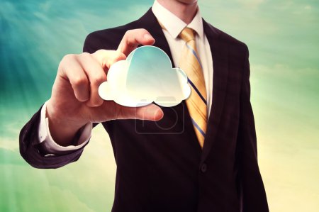 Businessman holding cloud computing icon
