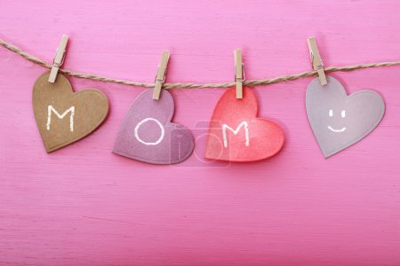Mothers day message on paper hearts