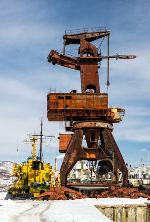 Old crane on seaport