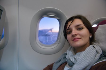 woman in airplane travel