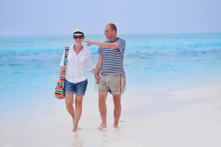 Couple walking at beach