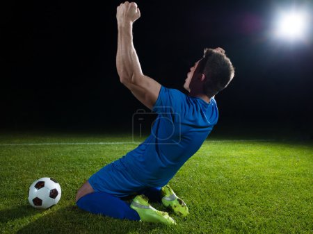 Football player is celebrating success