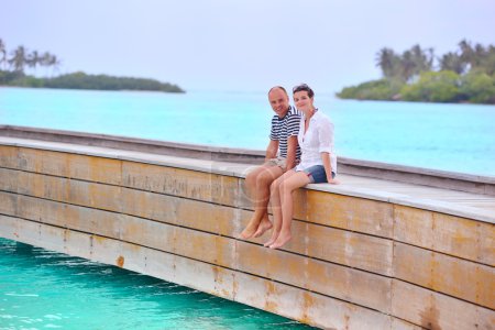 Couple at wooden jetty