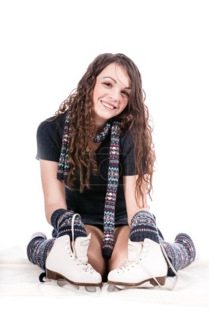 Beautiful girl with figure skates