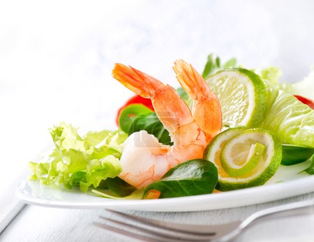 Prawn salad. Healthy Shrimp Salad with mixed greens and tomatoes