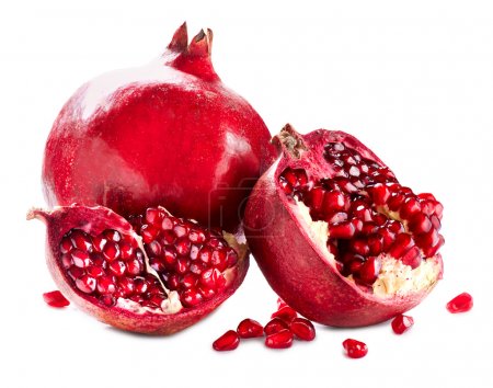 Pomegranates isolated on a White Background. Organic Bio fruits