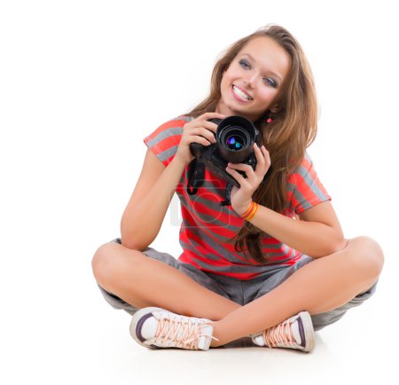 Teenage Girl with Professional Photo Camera. Isolated on white
