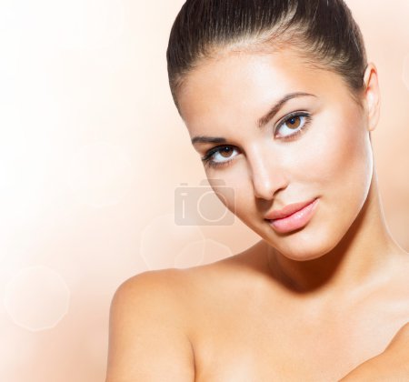 Beautiful Face of Young Woman with Clean Fresh Skin