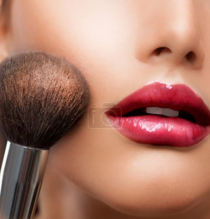 Make-up closeup. Cosmetic Powder Brush. Perfect Skin
