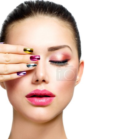 Fashion Beauty. Woman With Colorful Nails and Luxury Makeup