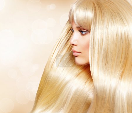 Blond Hair. Fashion Girl With Healthy Long Smooth Hair