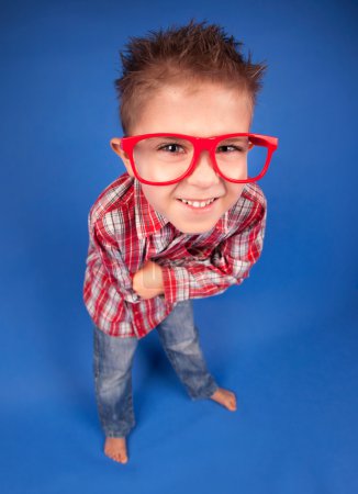 Funny five years old boy wearing glasses