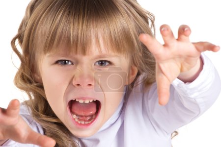 Portrait of a little screaming girl