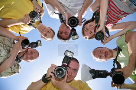 Six friends with cameras