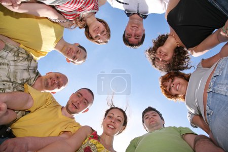 Group of nine friends are in a circle