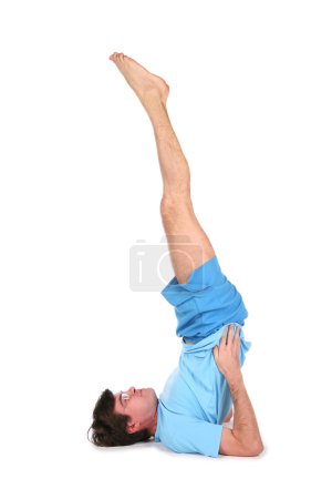 Yoga man with legs up