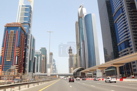 DUBAI - APRIL 18: general view on trunk road and skyscrapers on