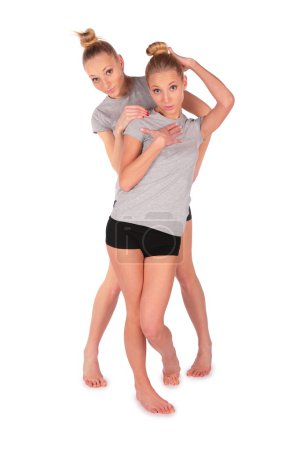 Twin sport girls posing