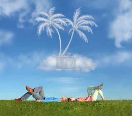 Lying couple on grass and dream island collage