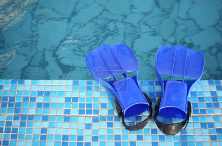 Flippers on the brink of pool