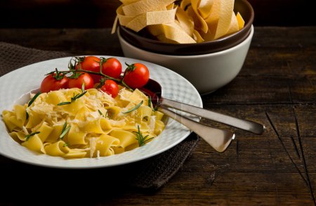 Pasta with cheese and rosemary