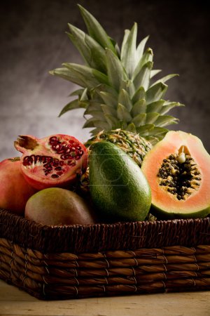 Basket with tropical fruits