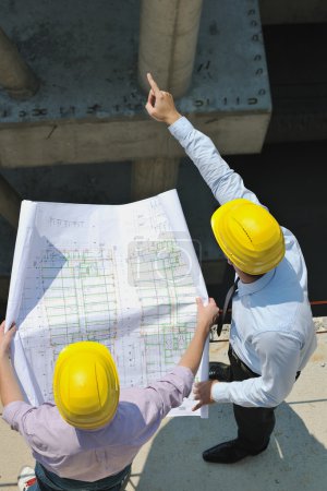 Team of architects on construciton site