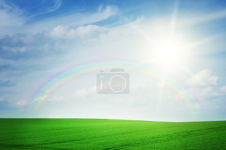 Summer landscape with rainbow