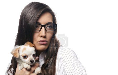 Beautiful young brunette woman with her dog
