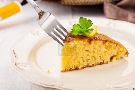 Lemon Sponge Cake on white wooden table