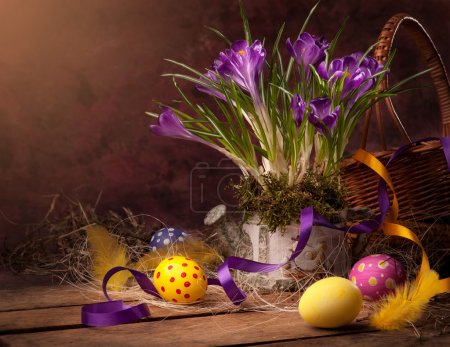 Easter basket with spring flowers & Easter eggs