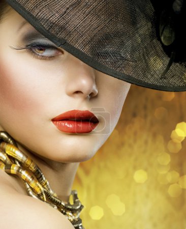 Fashion Beautiful Woman over luxury gold background