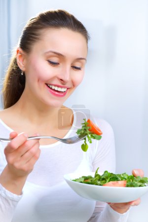 Diet. Healthy Young Woman Eating Vegetable Salad. Weight Loss co