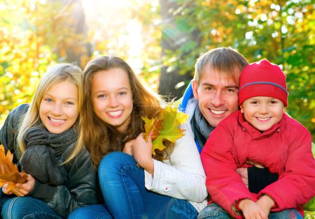 Happy Big Family With Kids Walking in Autumn Park.