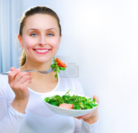 Diet. Healthy Young Woman Eating Vegetable Salad. Weight Loss co