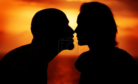 Couple Over Sunset Background