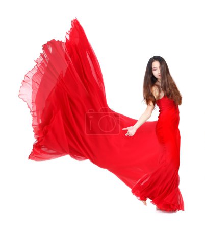Young Woman in Flowing Red Dress on White Background