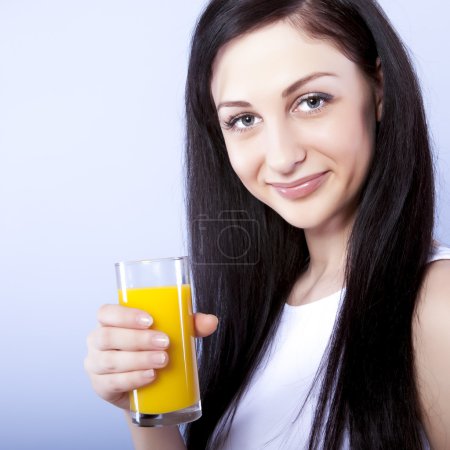Young woman with orange juice