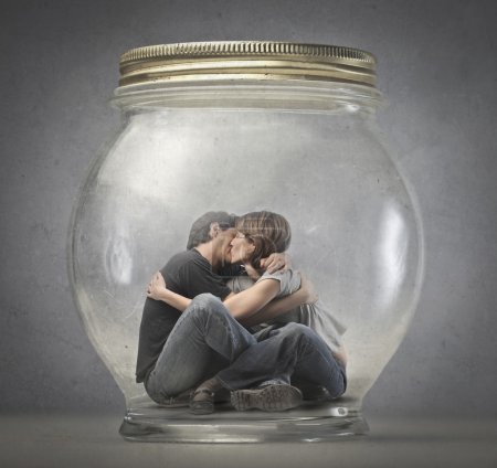 Couple kissing in a jar