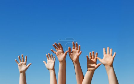 Children hands raised up