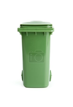 Green plastic garbage bin