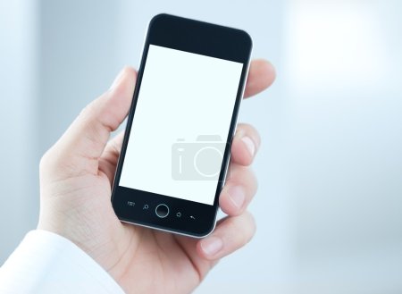 Blank smart phone in human hand