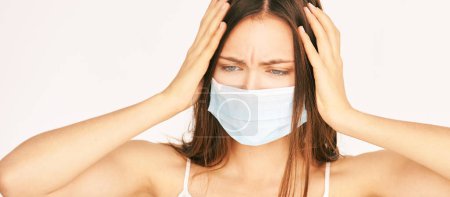 Sick beauty white girl with protective mask. Pandemic quarantine corona virus. Illness influenza patient. Anti flu treatment