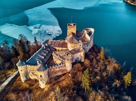 Beautiful panoramic aerial drone view to the Niedzica Castle also known as Dunajec Castle, located in the southernmost part of Poland in Niedzica, Nowy Targ County, Dunajec River, Lake Czorsztyn, PL