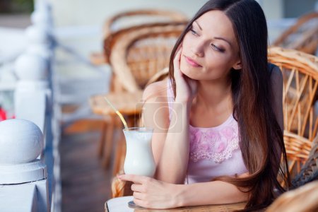Girl with milk cocktail