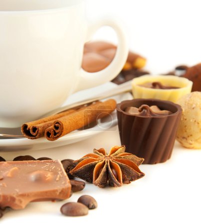 Cup of coffee with chocolates