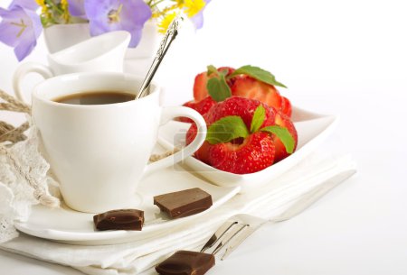 Strawberry with a mint and cup of coffee, chocolate