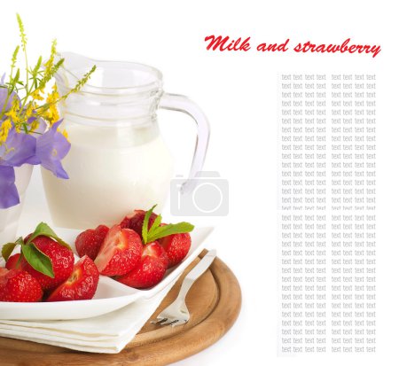 Strawberry with a mint and jug of milk on a white serviette